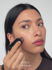 WESTMAN ATELIER Face Trace Contour Stick in Coco applied to the face
