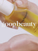 goop beauty Afterglow Body Oil applied to skin