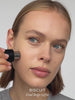 WESTMAN ATELIER Face Trace Contour Stick in Biscuit applied to the cheek