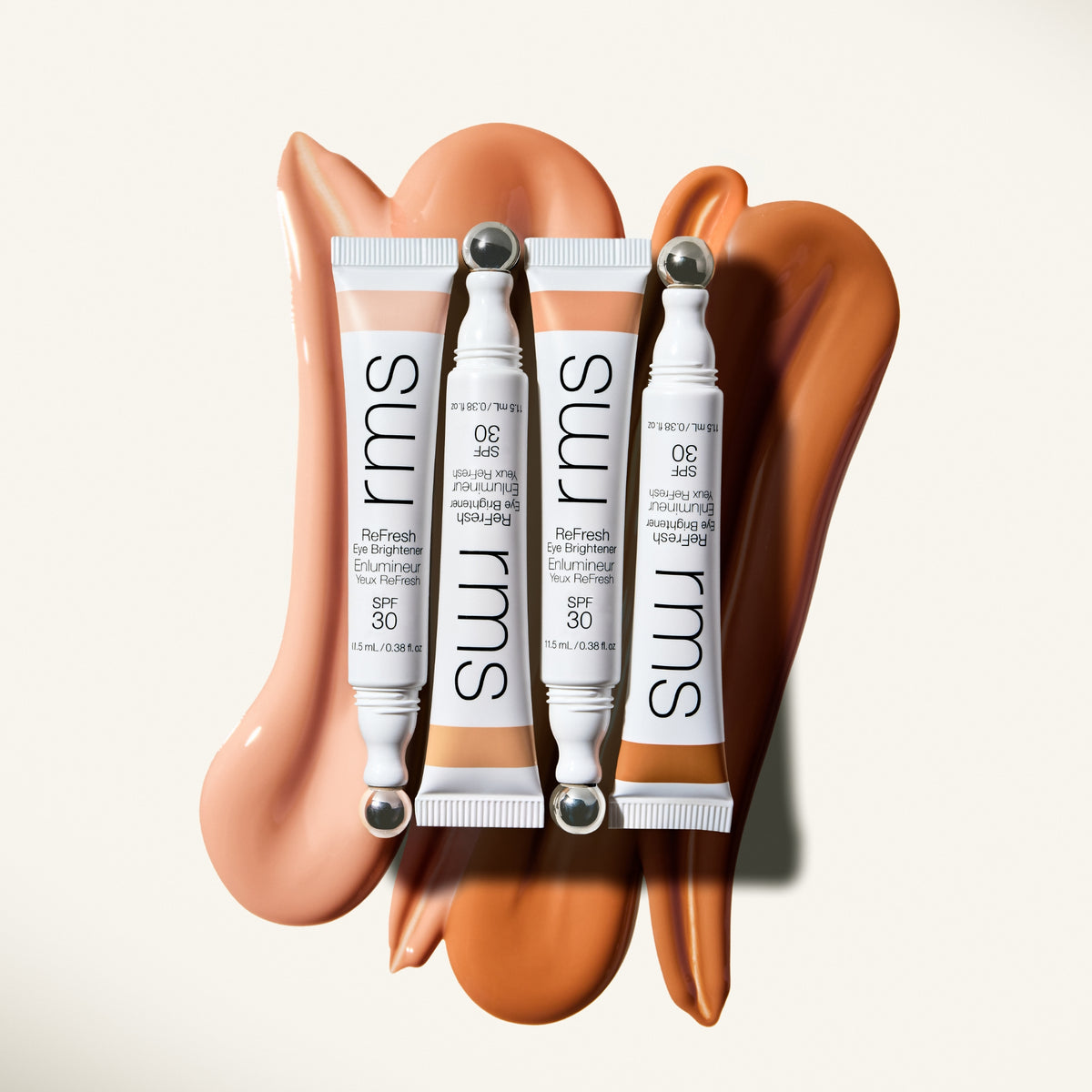 Application of RMS BEAUTY ReFresh Eye Brightener SPF 30 + Correcting Tint on the eye area