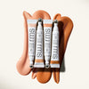 Application of RMS BEAUTY ReFresh Eye Brightener SPF 30 + Correcting Tint on the eye area