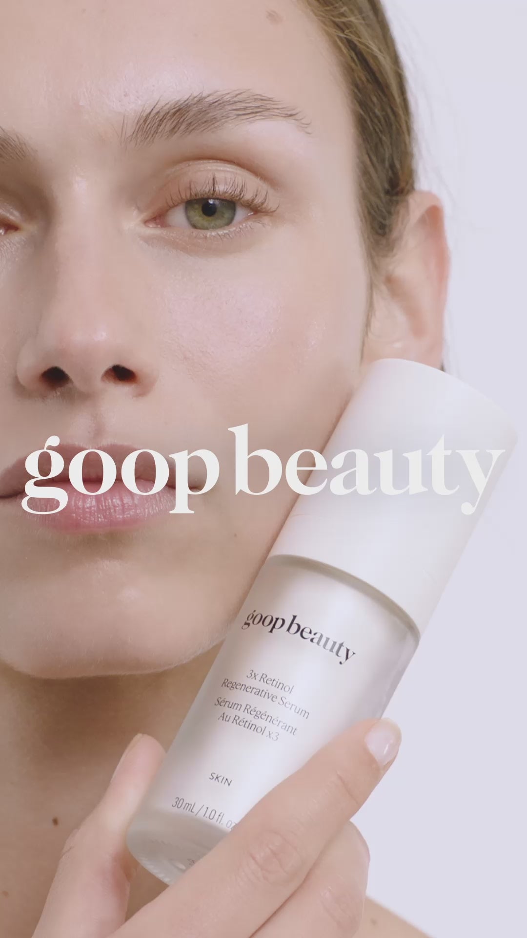 Model applying goop beauty 3x Retinol Regenerative Serum