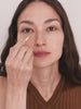 WESTMAN ATELIER Vital Skincare Concealer L4 application under the eyes