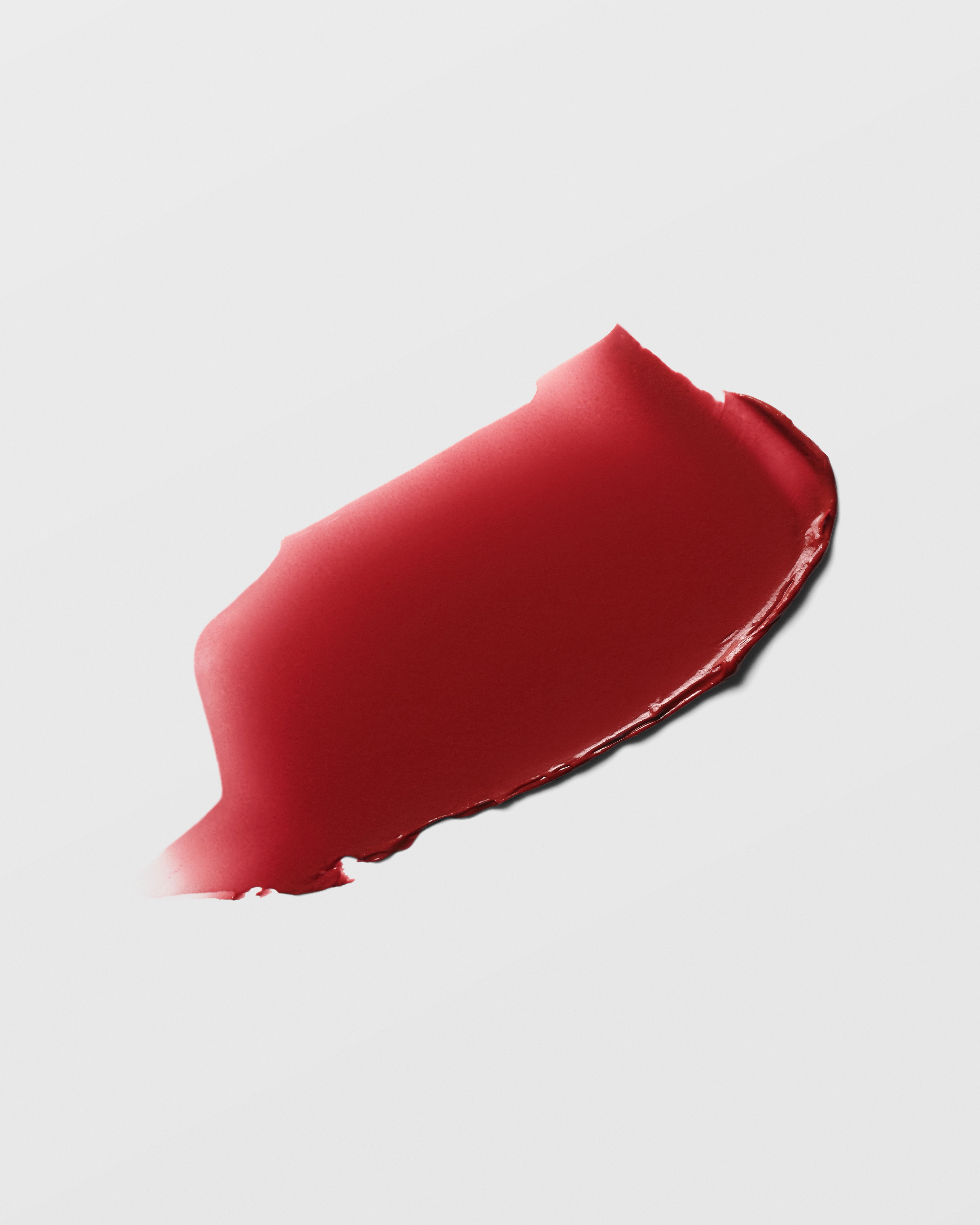 Video showcasing Westman Atelier HydroBalm Tinted Lipstick in red shades with close-up product views and lip color swatches.