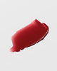 Video showcasing Westman Atelier HydroBalm Tinted Lipstick in red shades with close-up product views and lip color swatches.