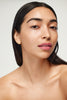 WESTMAN ATELIER Liquid Super Loaded Sheer Illuminator in Peau de Pêche application on skin