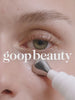 Applying goop beauty Retinol Eye Cream with cooling metal applicator