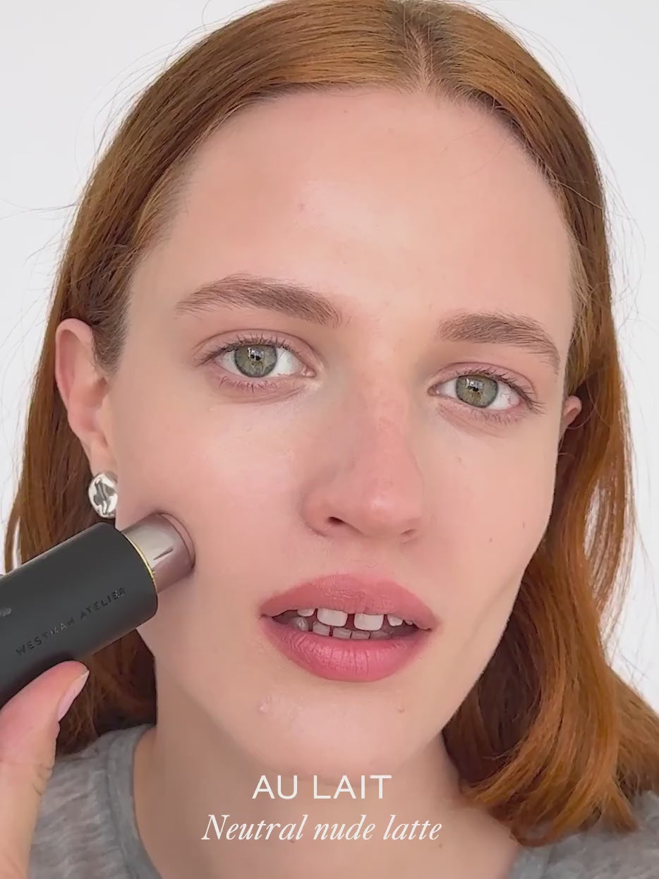 WESTMAN ATELIER Face Trace Contour Stick in Au Lait applied to the cheek
