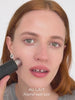 WESTMAN ATELIER Face Trace Contour Stick in Au Lait applied to the cheek