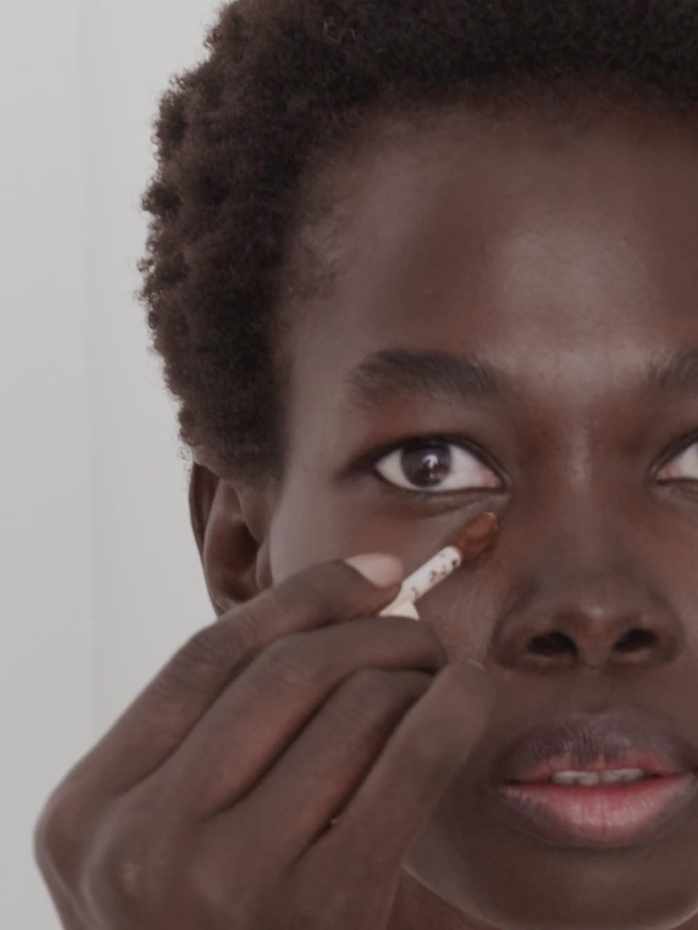 WESTMAN ATELIER Vital Skincare Concealer in Atelier D4 being applied