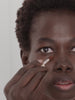 WESTMAN ATELIER Vital Skincare Concealer in Atelier D4 being applied