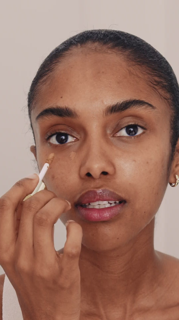 WESTMAN ATELIER Vital Skincare Concealer in Atelier T4 being applied