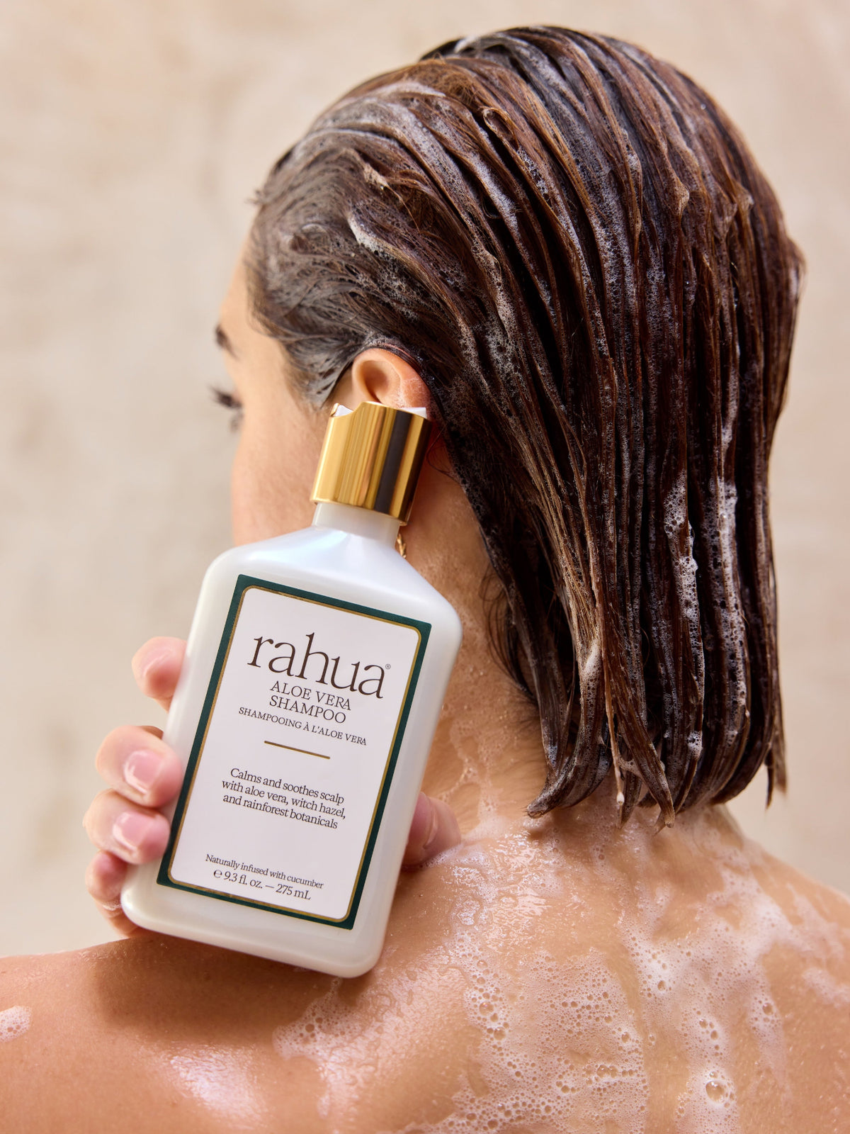 Rahua Aloe Vera Shampoo applied to wet hair for gentle cleansing and scalp care