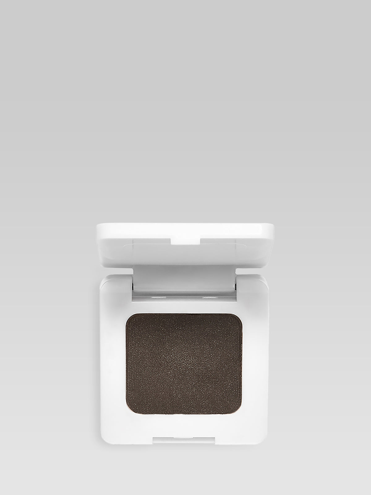 RMS Beauty Back2Brow Powder in Dark in an open white compact