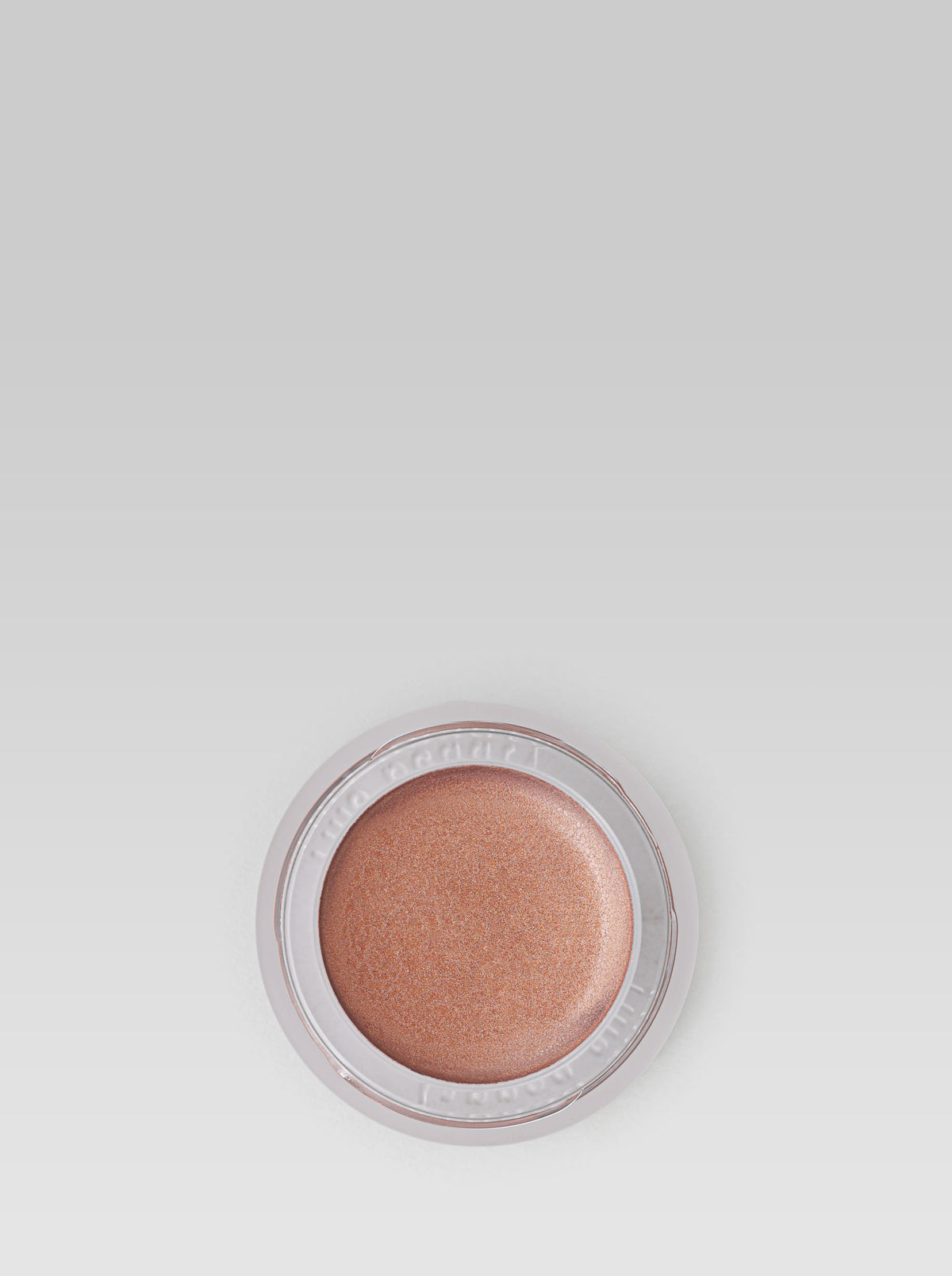 Open RMS Beauty Buriti Cream Bronzer showing its warm bronze cream formula