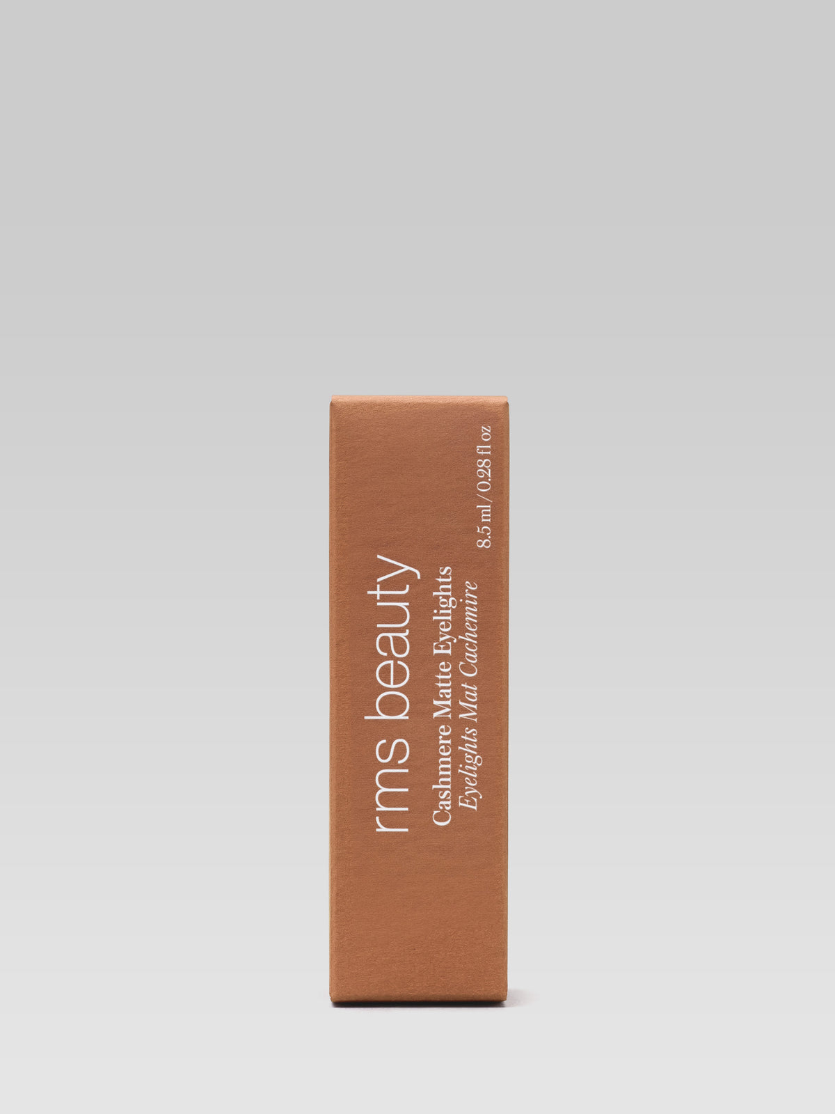 RMS Beauty Cashmere Matte Eyelights in Dusty Trail shown in its matching terracotta product box