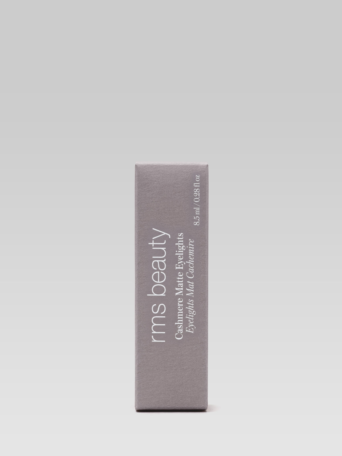 RMS Beauty Cashmere Matte Eyelights in Mountain Mist, shown in its matching grey-beige cardboard packaging