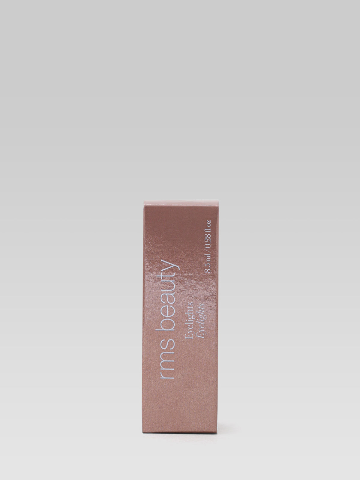RMS Beauty Eyelights Cream Eye Shadow in Flare product packaging in a rose-toned box