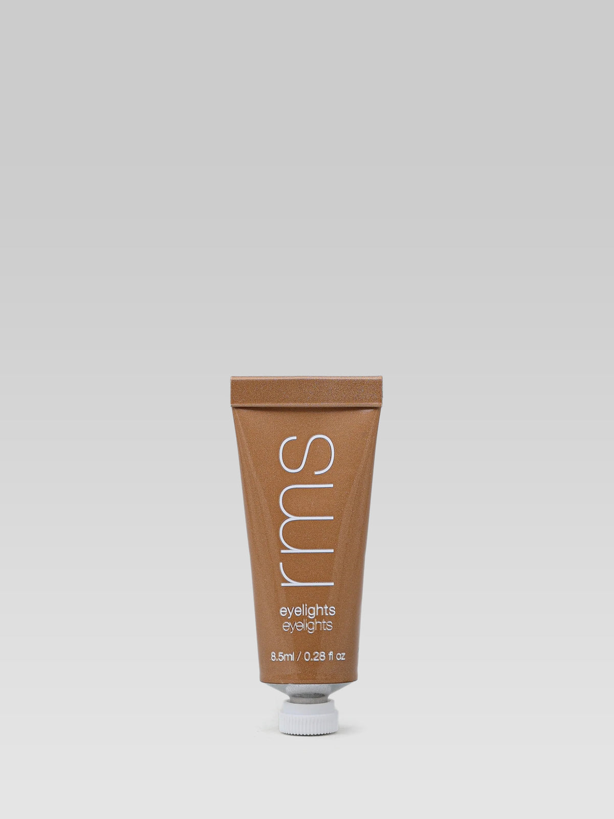 RMS Beauty Eyelights Cream Eyeshadow in Flare in a bronze tube