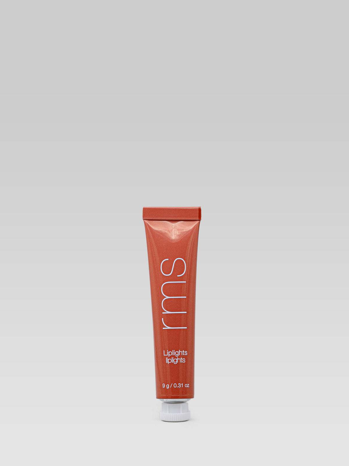RMS Beauty Lip Lights Cream Lip Gloss in Bisou in a terracotta-toned squeeze tube against a neutral background