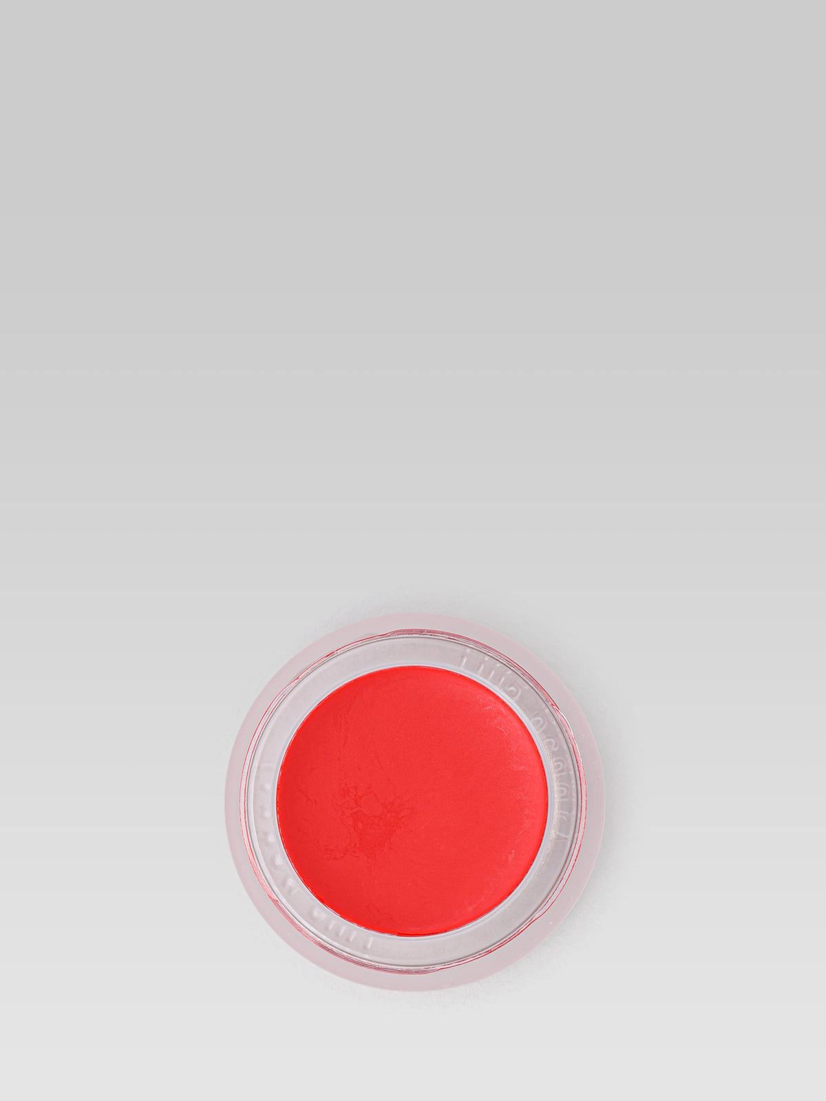 RMS Beauty Lip2Cheek in Beloved, a vibrant coral-red cream blush in a round compact