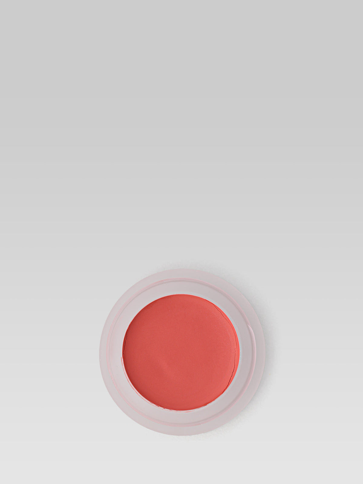 RMS Beauty Lip2Cheek in Modest, coral-pink cream blush in an open round pot on a light background