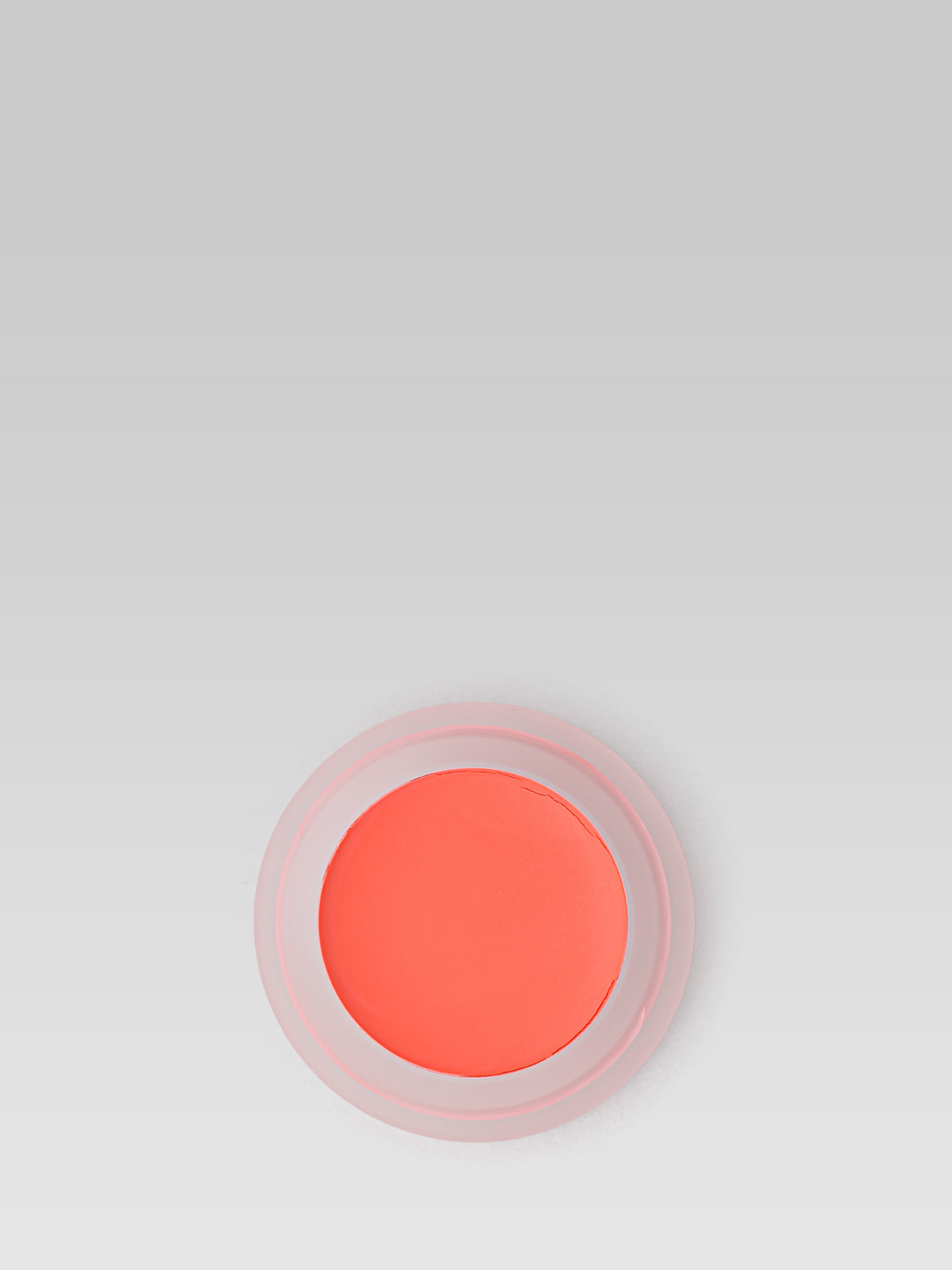 RMS Beauty Lip2Cheek in Smile, a bright coral-orange cream blush in an open round pot on a light background