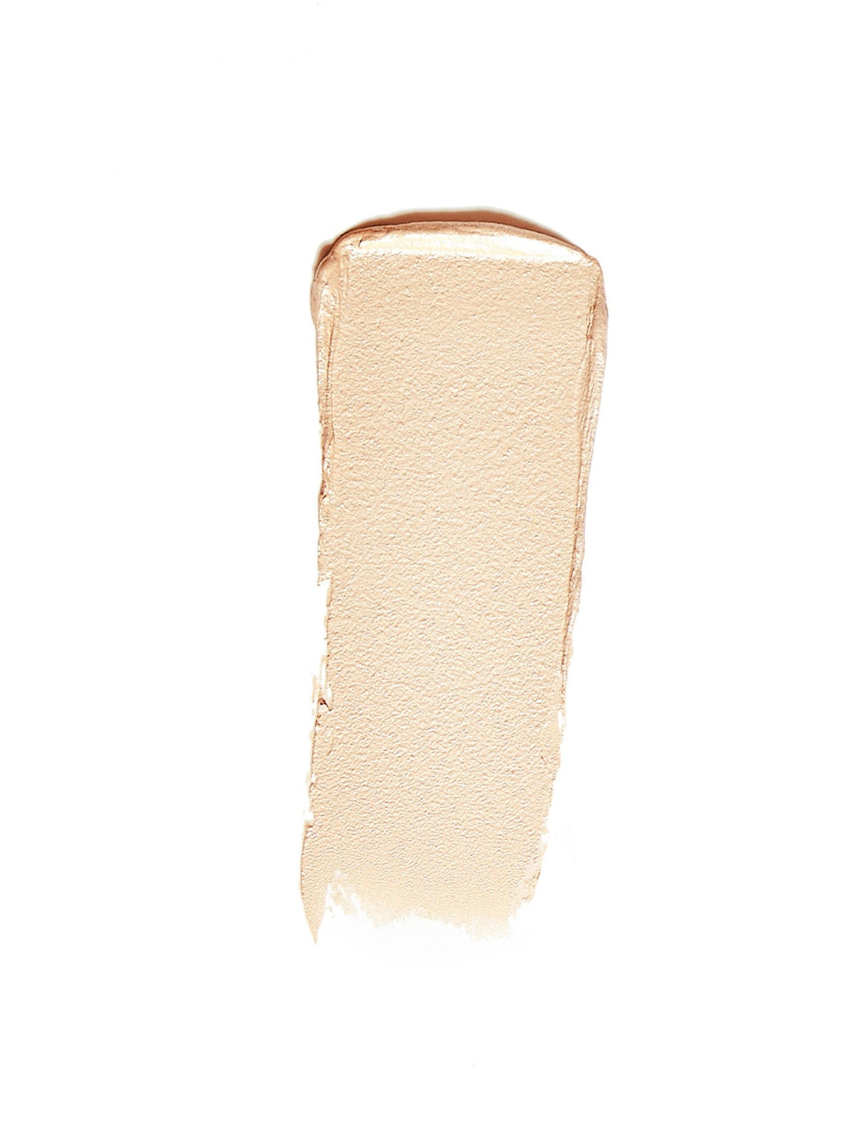 RMS Beauty Magic Luminizer swatch showing a creamy, light champagne shade with a subtle golden-peach shimmer on a white background