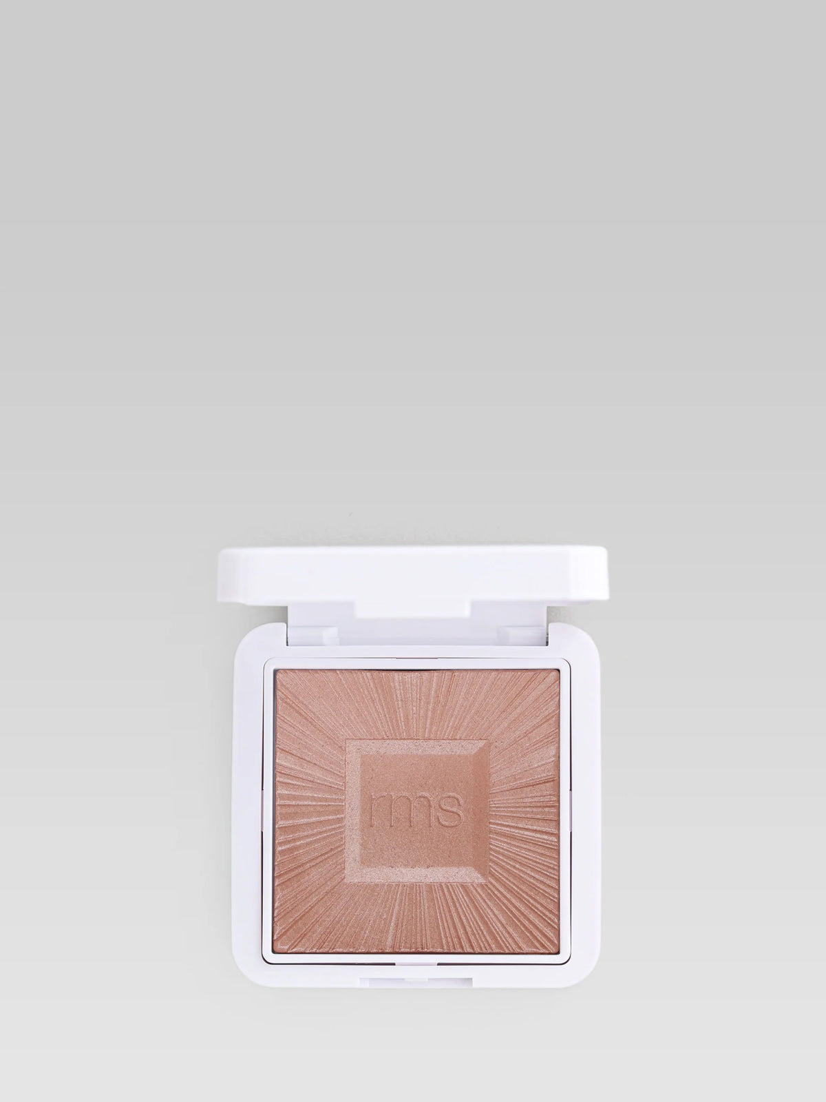 Open RMS Beauty ReDimension Hydra Bronzer in Malibu Muse showing the embossed powder in a white compact.