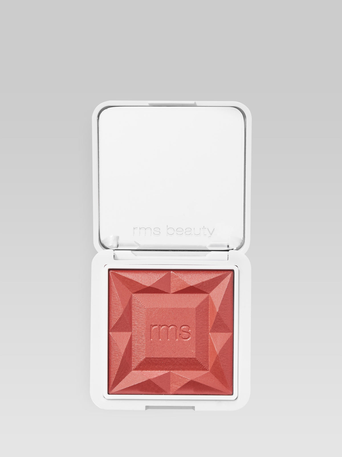 RMS Beauty ReDimension Hydra Powder Blush in Sangria in an open compact
