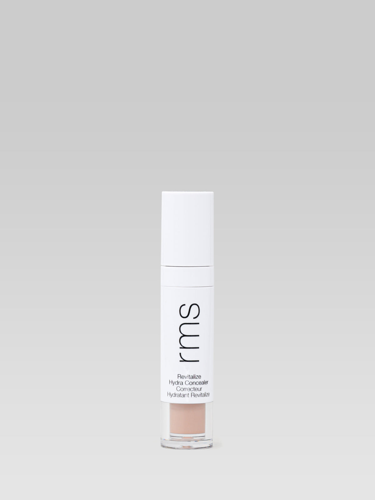 RMS Beauty Revitalize Hydra Concealer in shade CN018 shown as a creamy concealer swatch on a transparent background
