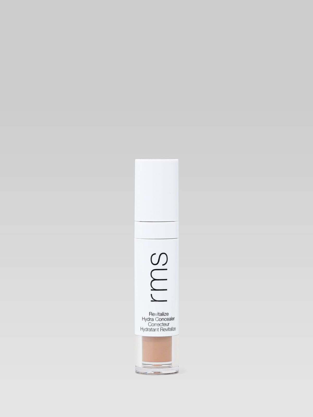 RMS Beauty Revitalize Hydra Concealer in shade ON021, shown in its white applicator tube.