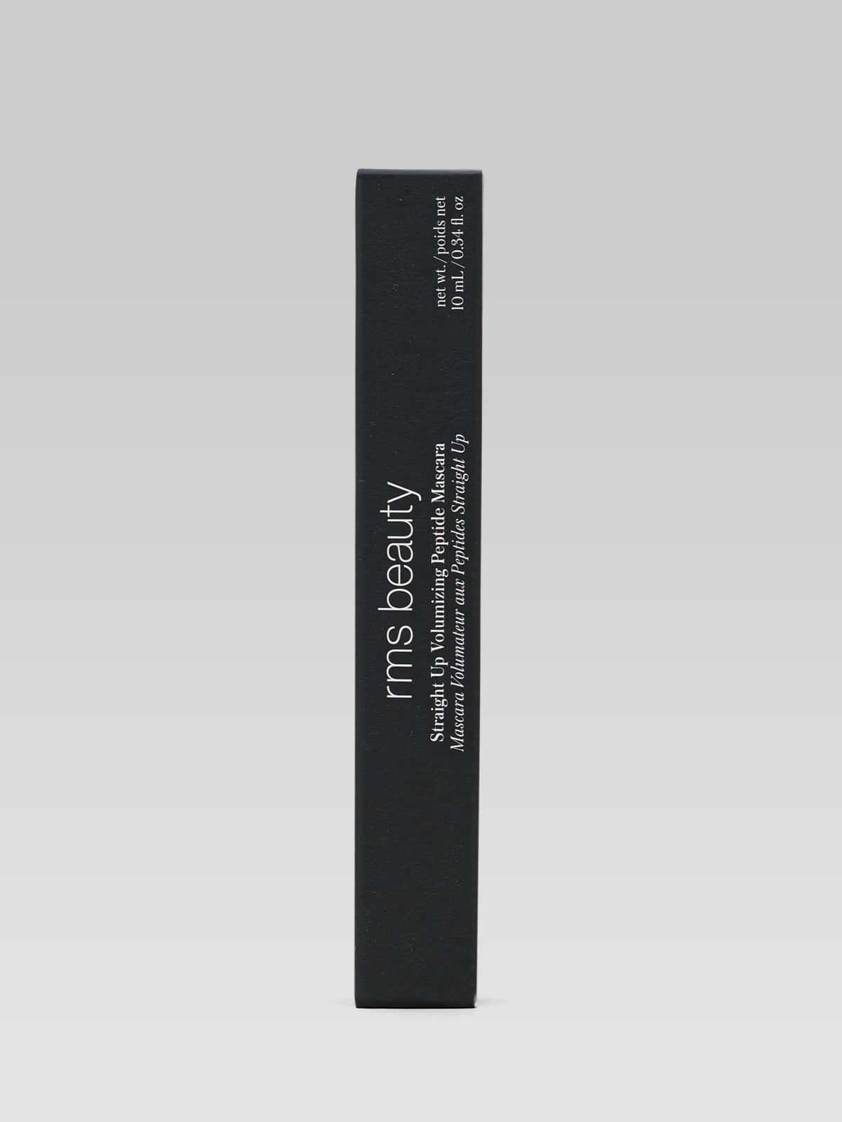 RMS Beauty Straight Up Volumizing Peptide Mascara in its black outer carton, photographed against a light background