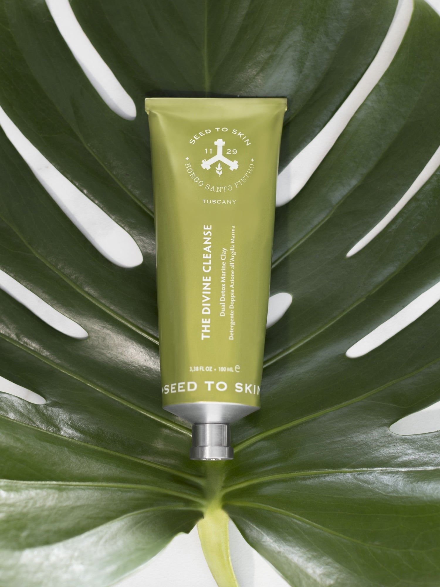 SEED TO SKIN The Divine Cleanse Dual Detox Marine Clay on tropical leaf