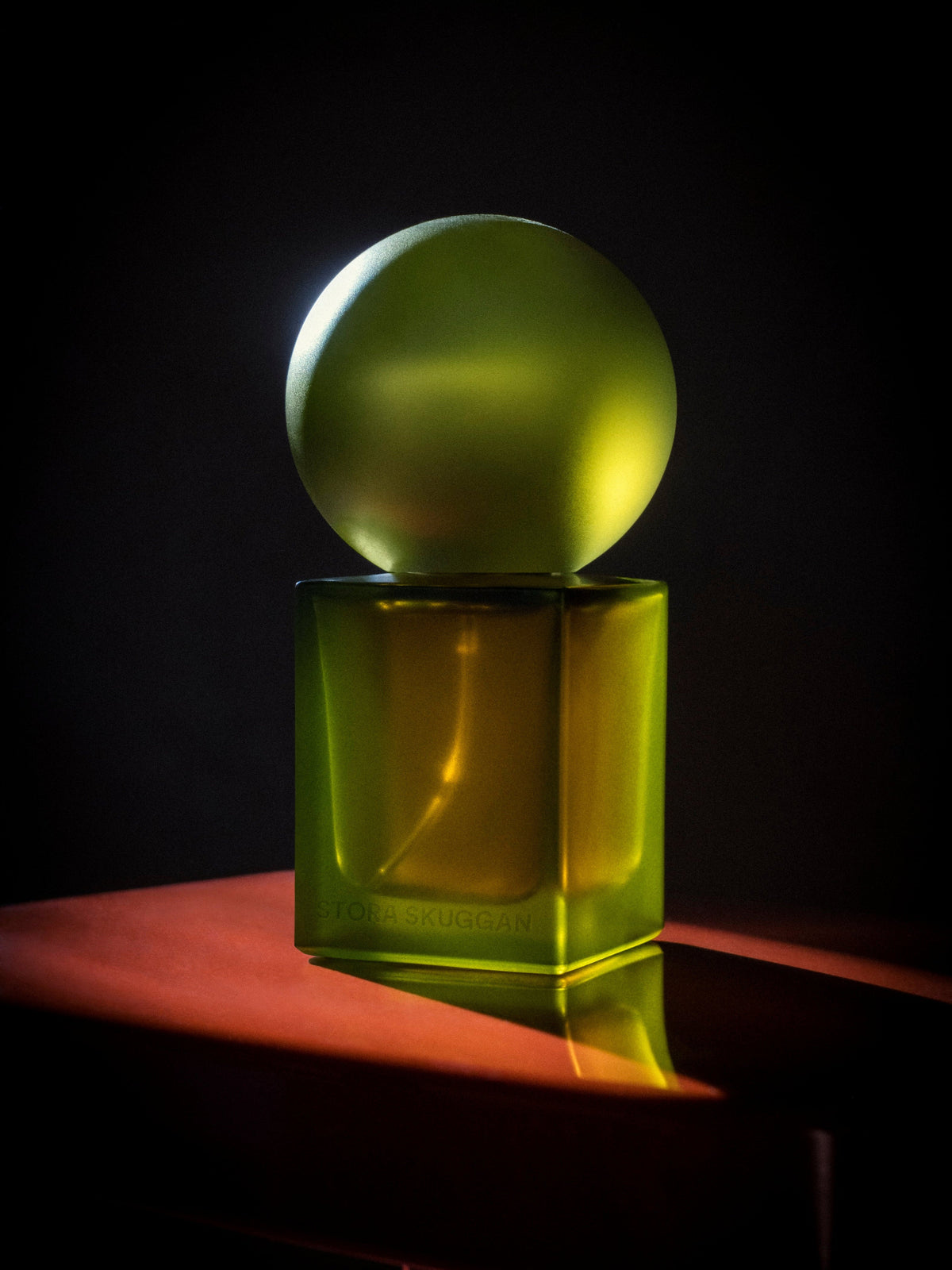 Stora Skuggan Pine Eau de Parfum bottle in a dark setting