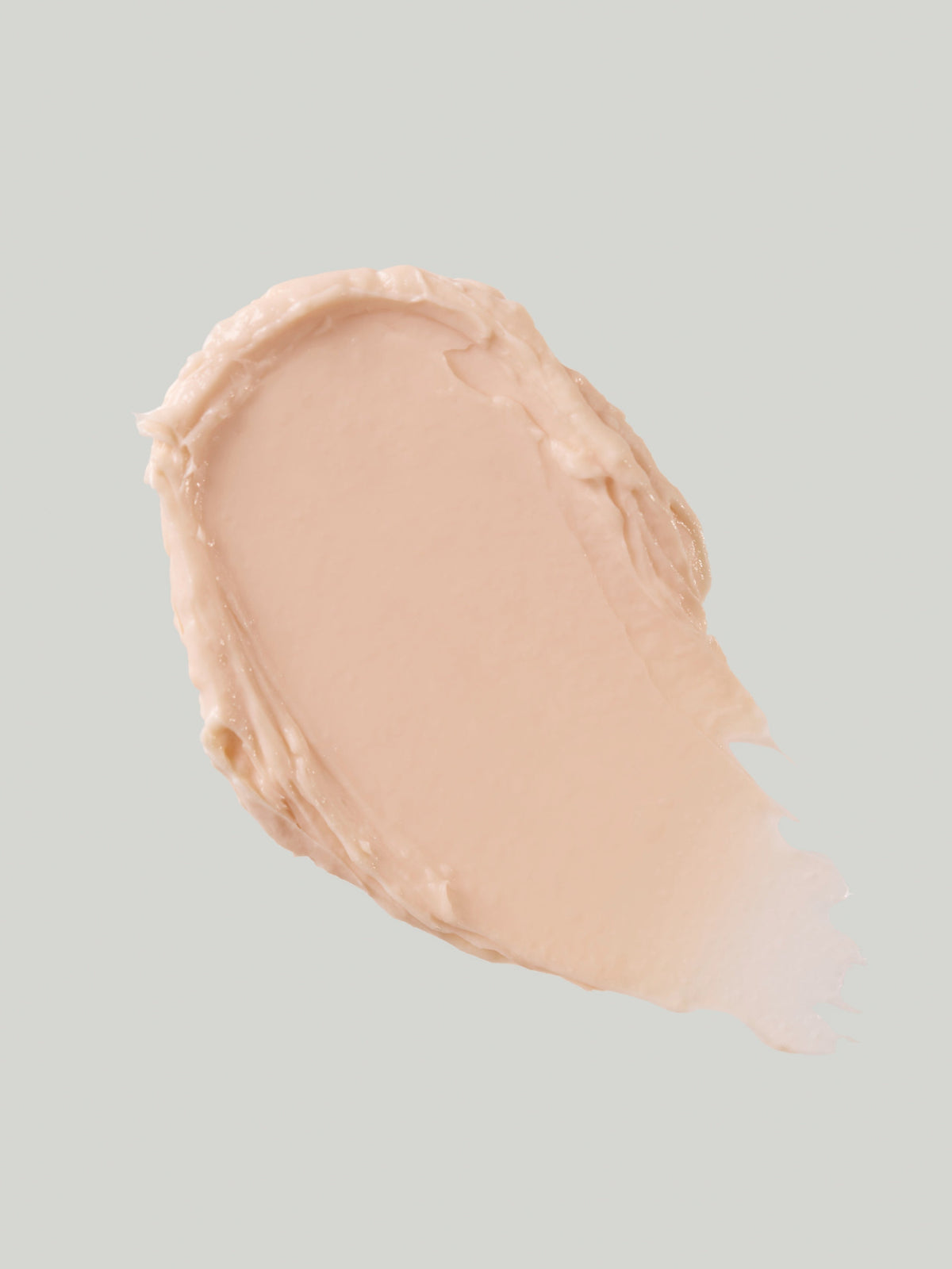 Close-up of the peach-coloured cream texture of Susanne Kaufmann Glow Mask