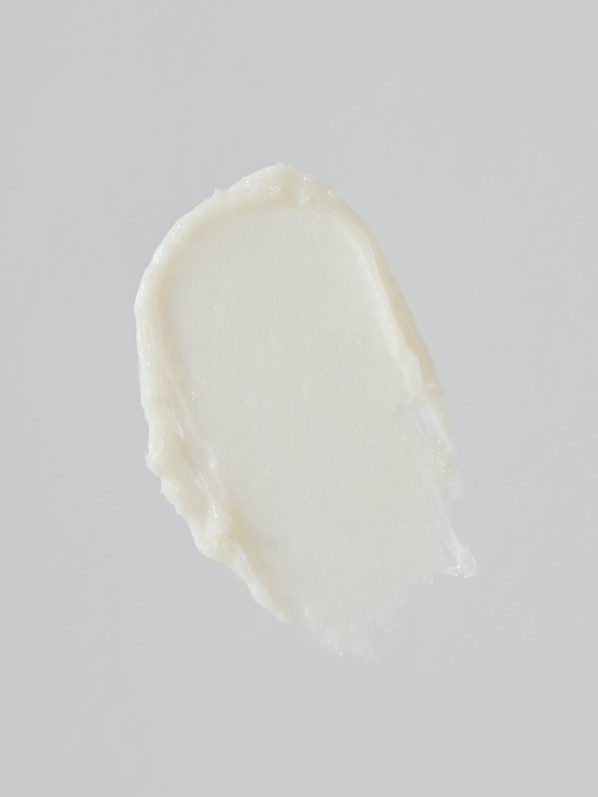 Close-up of the creamy white texture of Susanne Kaufmann Lip Balm