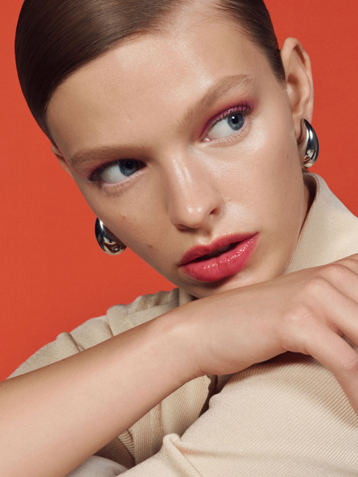 U Beauty Resurfacing Compound skincare on model