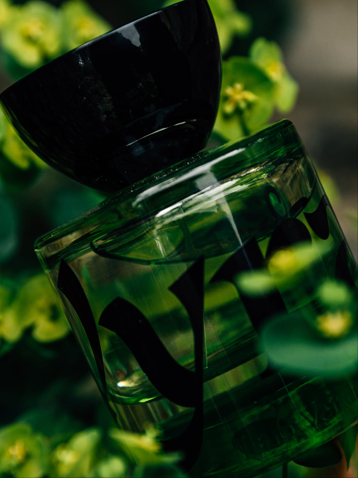 VYRAO I’m Verdant Eau de Parfum green fragrance bottle surrounded by flowers