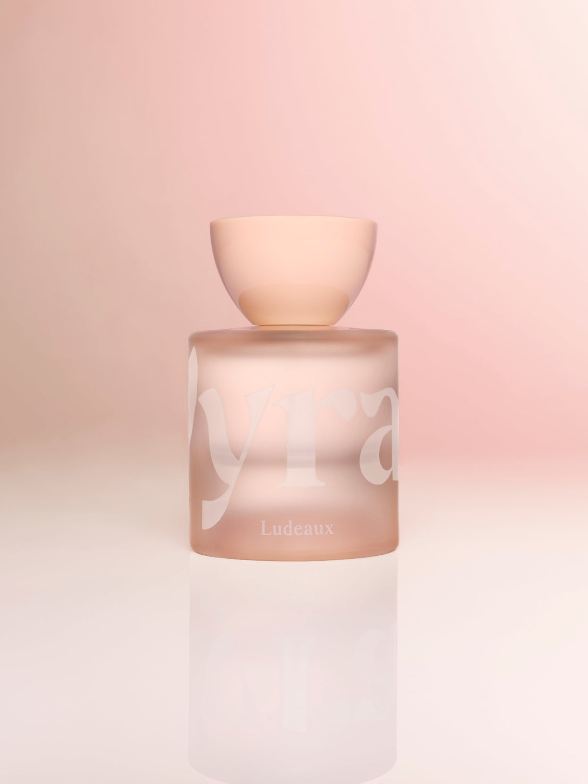 VYRAO Ludexa Eau de Parfum bottle on a soft pink background