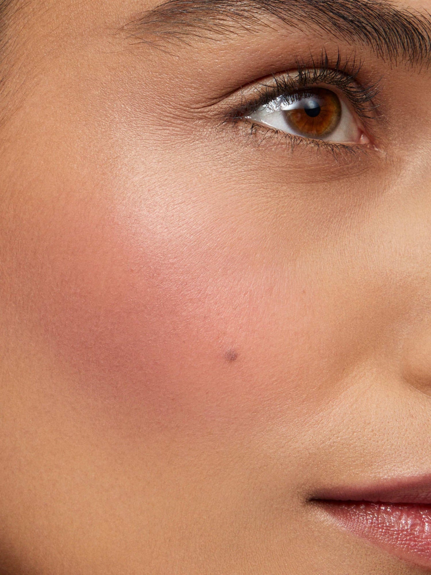 Westman Atelier Baby Cheeks Blush Stick in Bichette on cheek