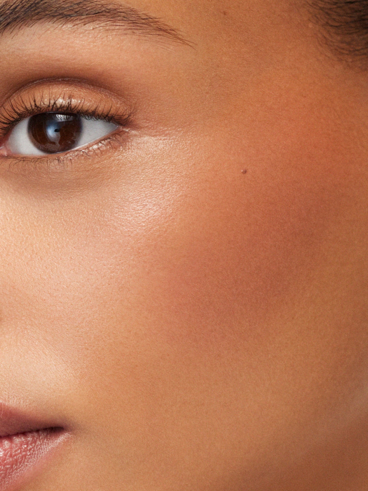 Westman Atelier Baby Cheeks Blush Stick in Garconne on cheek
