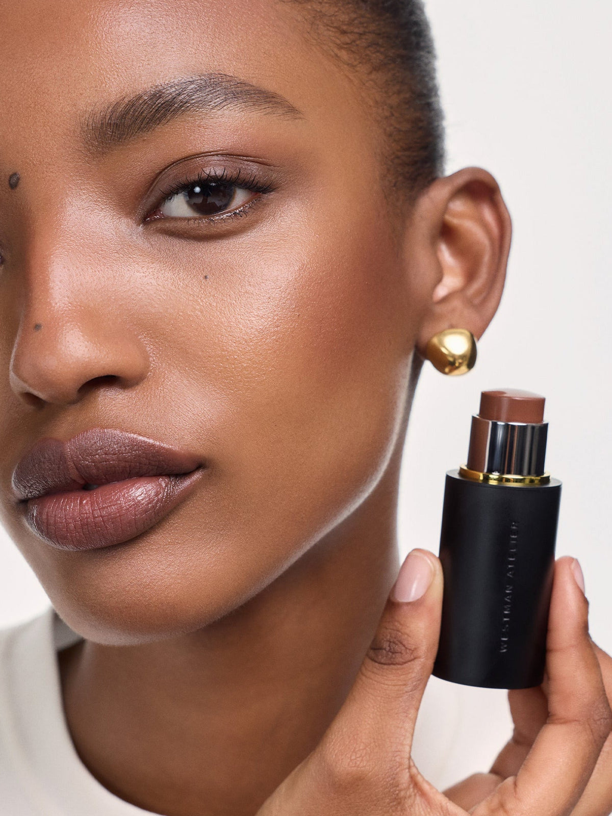 WESTMAN ATELIER Face Trace Contour Stick in Whiskey on model