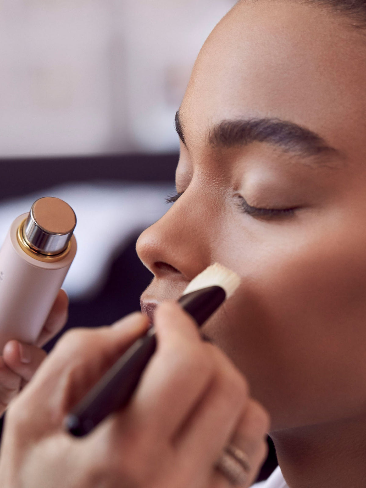 WESTMAN ATELIER Foundation Brush applying foundation makeup