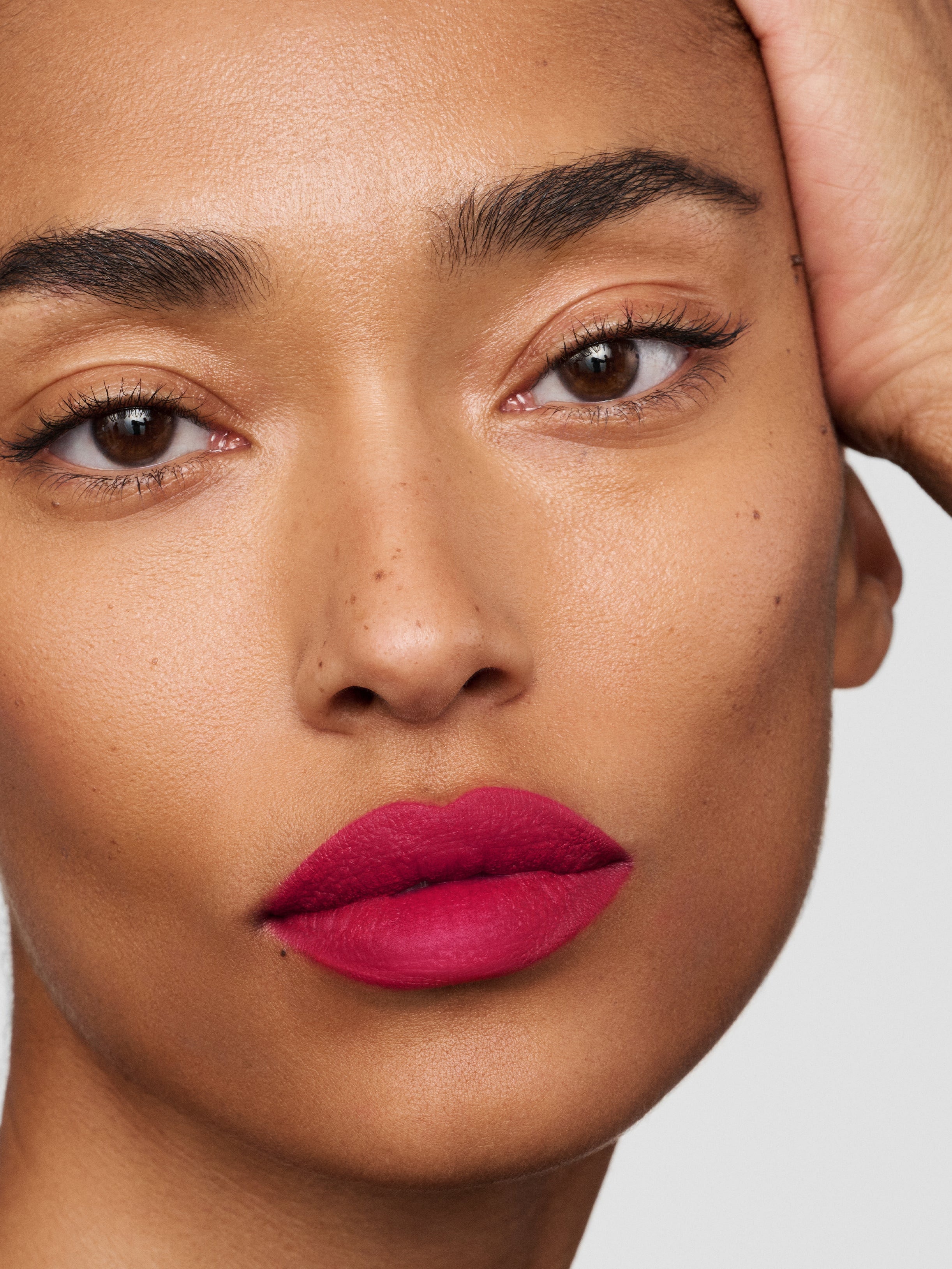 Westman Atelier Lip Suede Matte Lipstick in LFG on lips