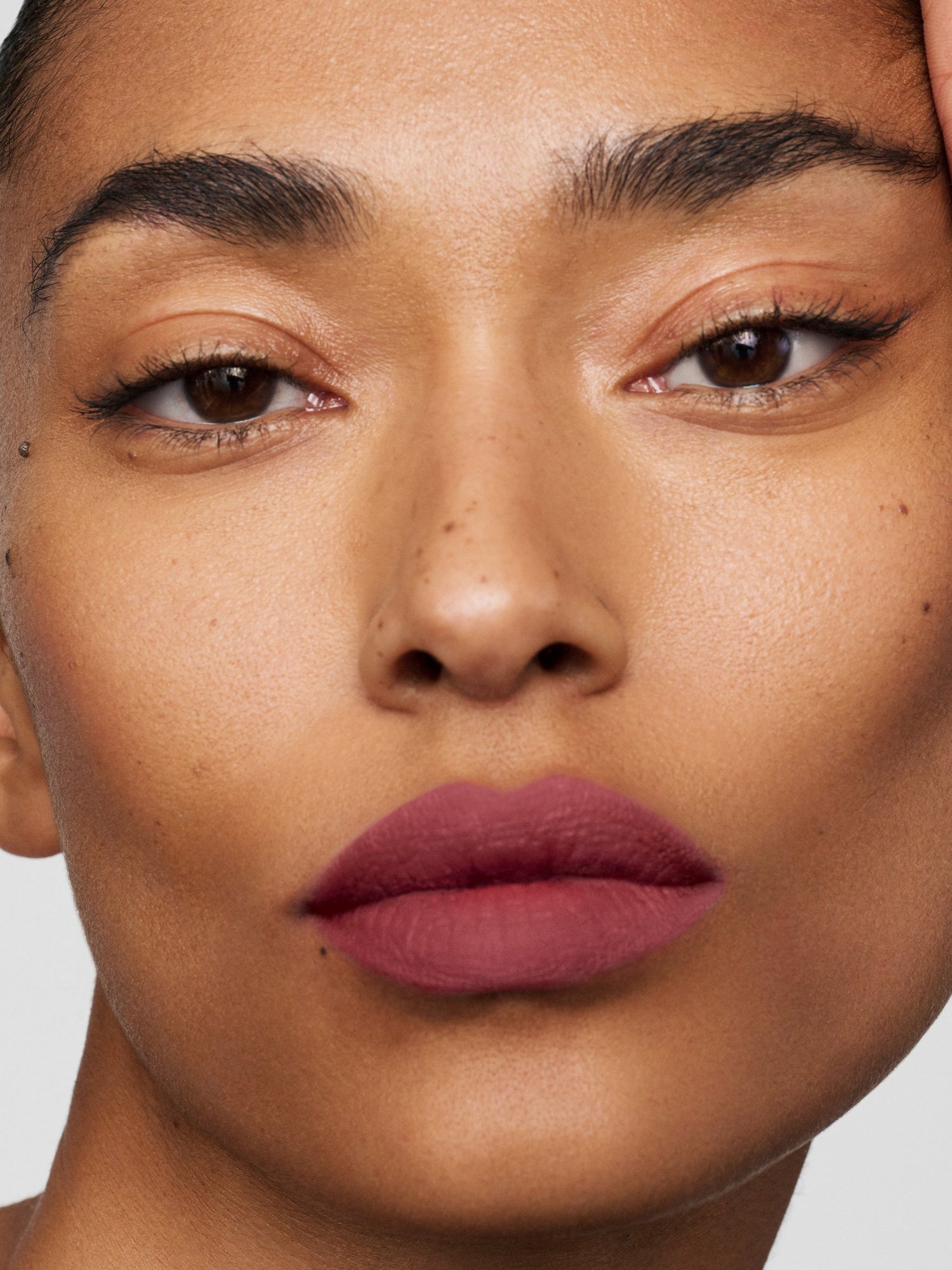 Westman Atelier Lip Suede Matte Lipstick in Je Reve on lips