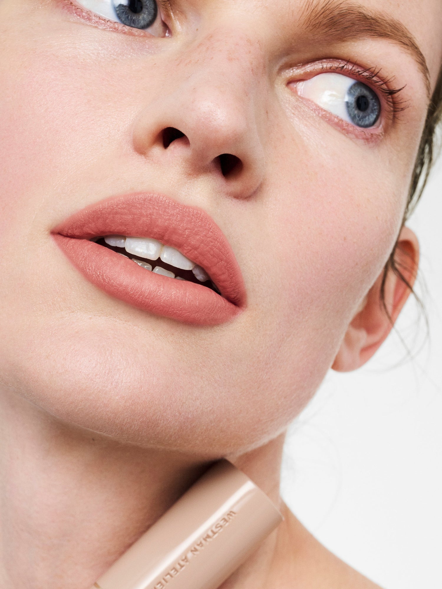 Westman Atelier Lip Suede Matte Lipstick in Laecker on lips