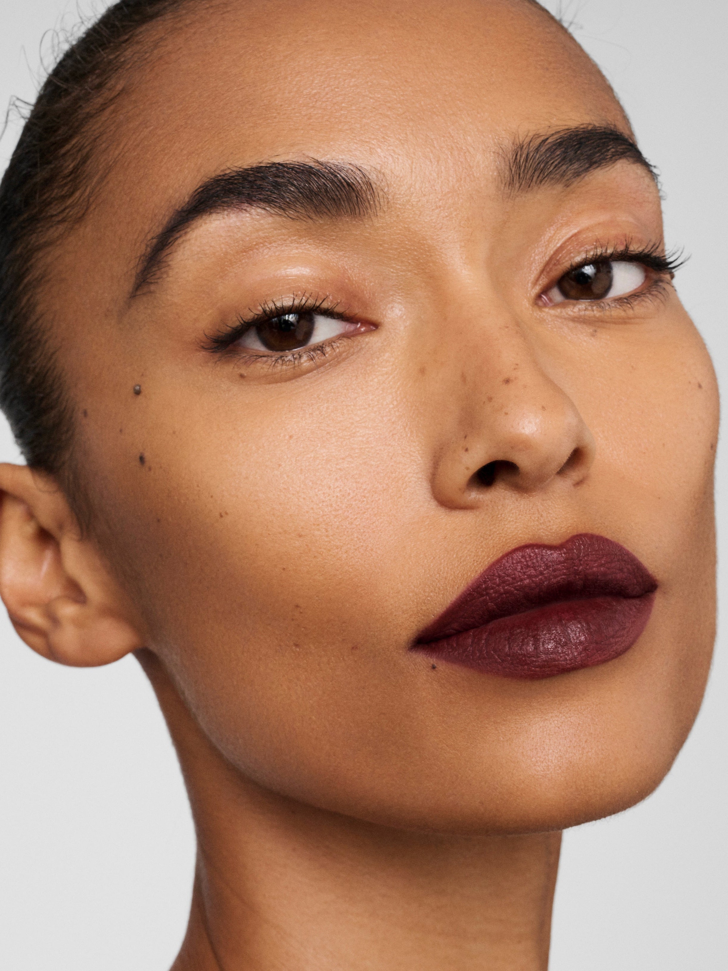 Westman Atelier Lip Suede Matte Lipstick in Lou Lou on lips