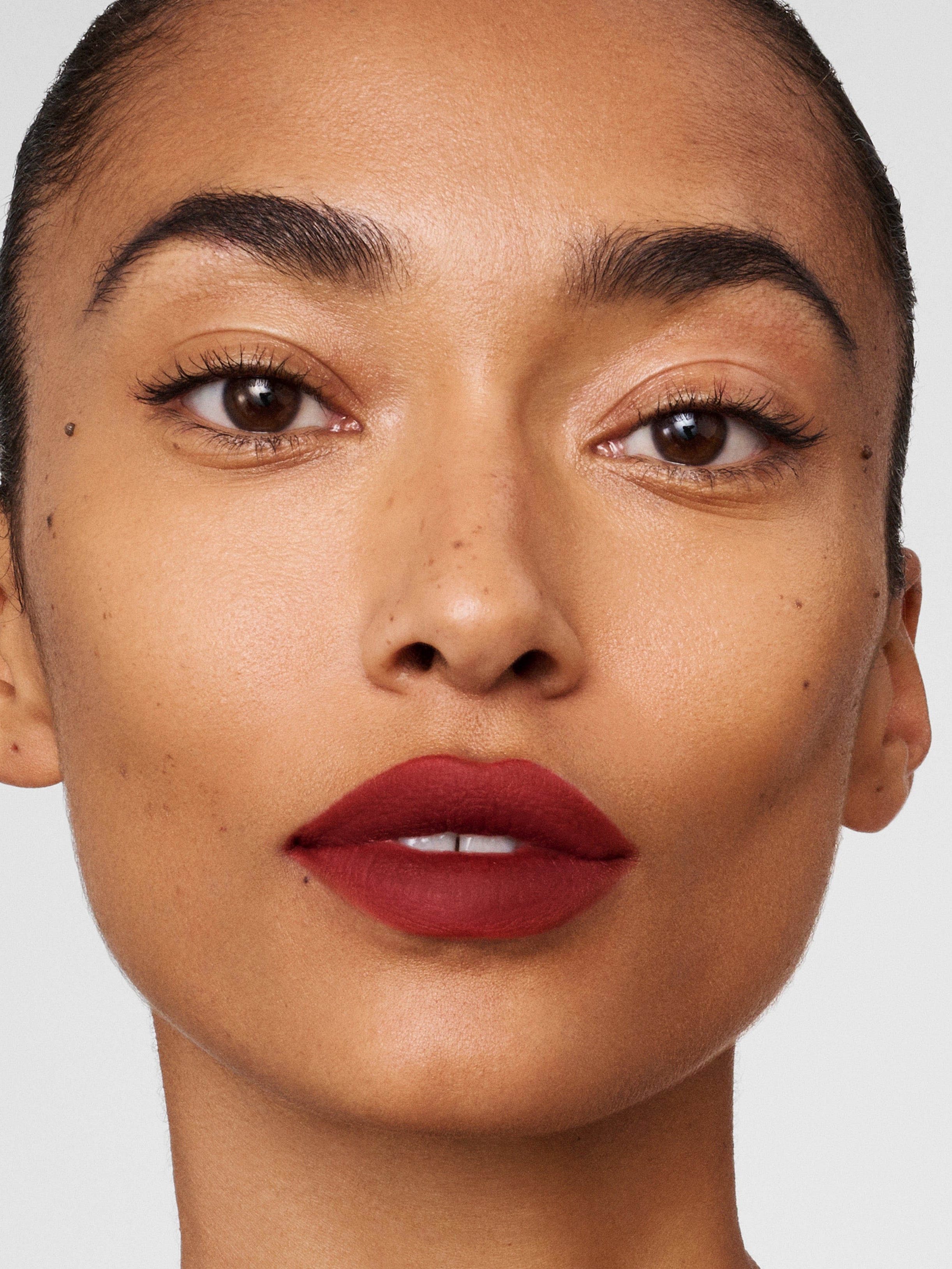 Westman Atelier Lip Suede Matte Lipstick in Ma Biche on lips