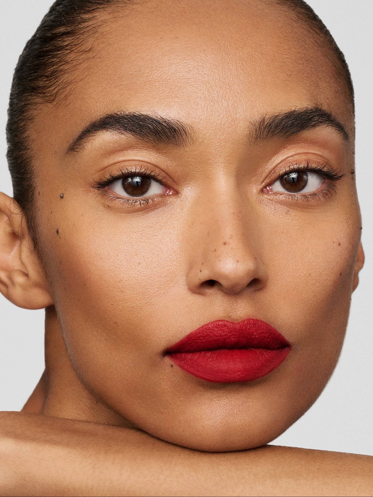 Westman Atelier Lip Suede Matte Lipstick in Pip on lips